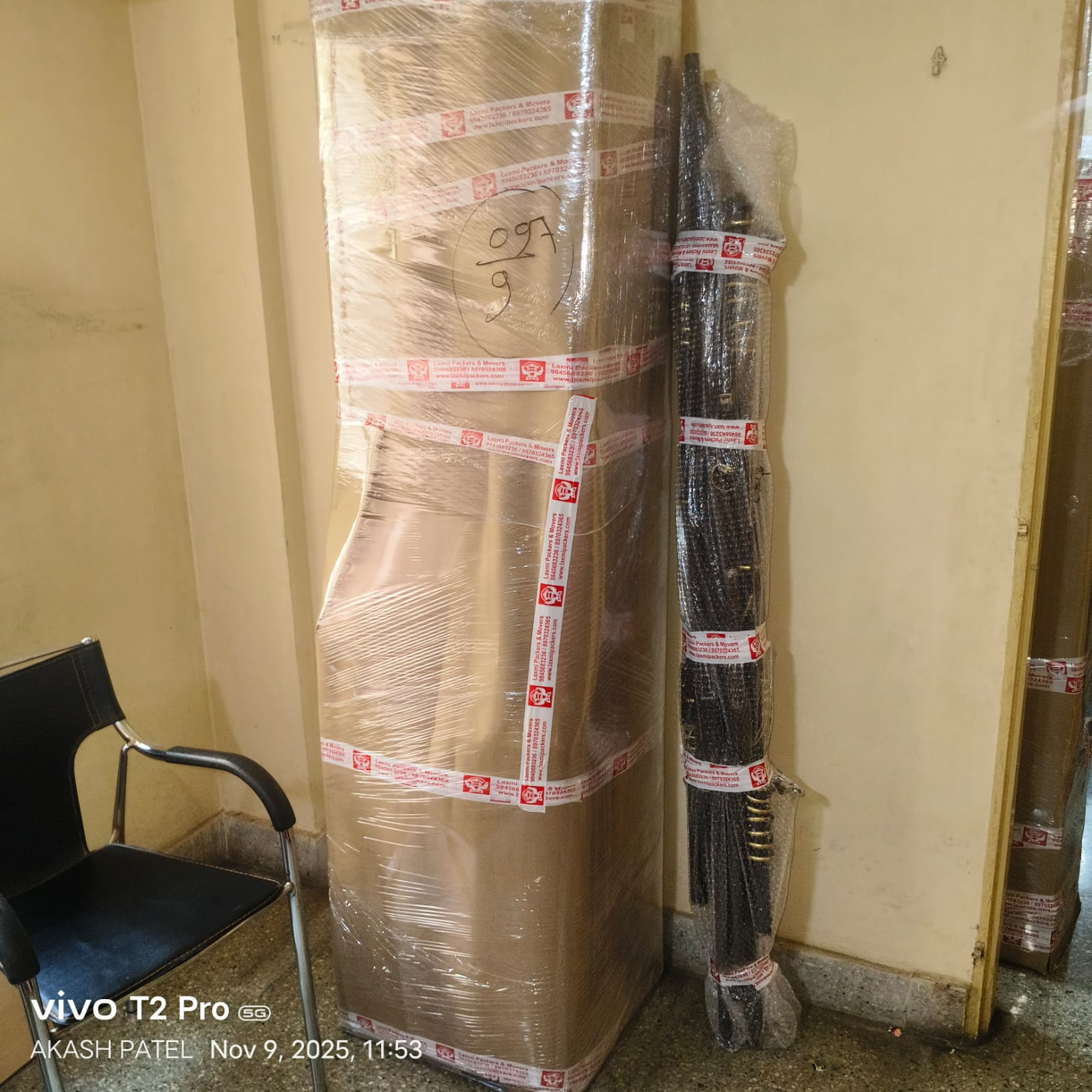 Experienced packers and movers in Bangalore carefully packing various household items for safe relocation